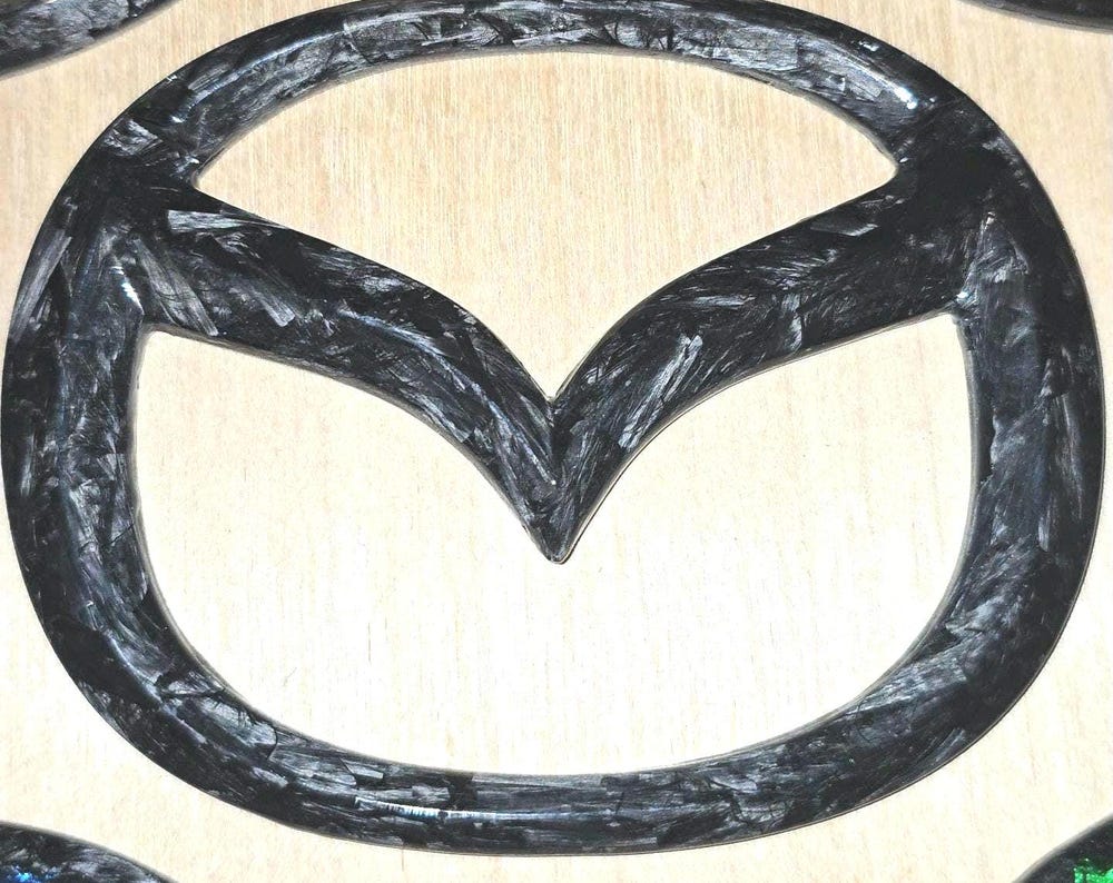 Genuine forged carbon fibre mazda badge 105mm x 84mm